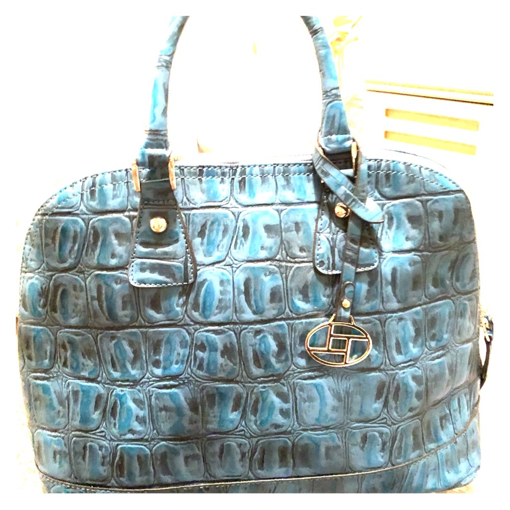 Beautiful blue handbag. Like new.